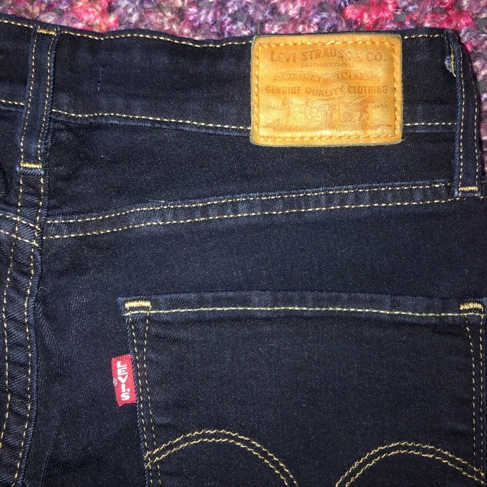 721 High Rise Skinny Jeans - Picture 7 of 8